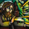 Vibrant stained glass depiction of a figure.